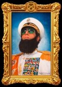 His Excellency, Admiral General Colonel Doctor Aladeen, Democratic President-For-Life, Invincible and All-Triumphant Commander, Chief Ophthalmologist, Brilliant Genius of Humanity, Excellent Swimmer Including Butterfly, and Beloved Oppressor and Ruthless Protector of the Precious and Expendable People of Wadiya.